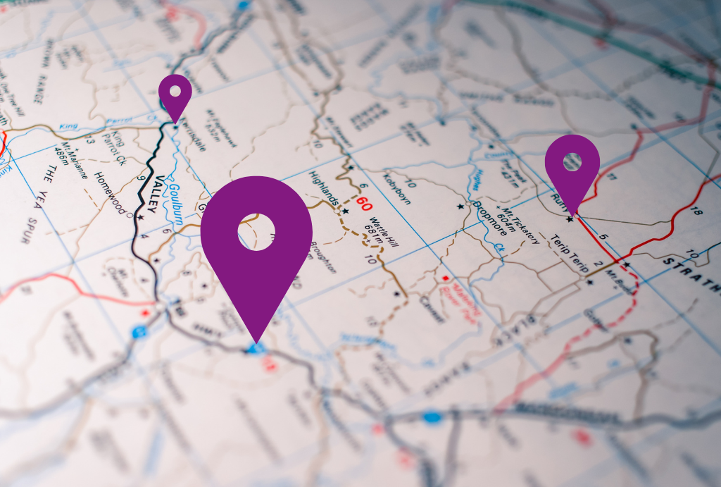 Image of a white map with three purple site markers.